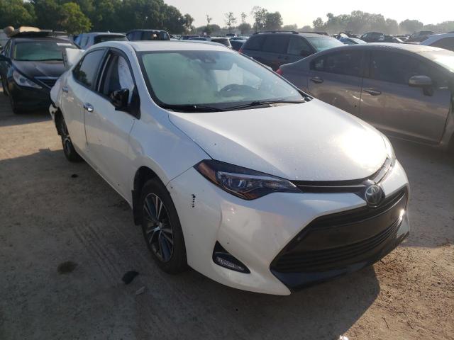 TOYOTA COROLLA L 2018 with VIN 5YFBURHE7JP789482 - Photo from auction