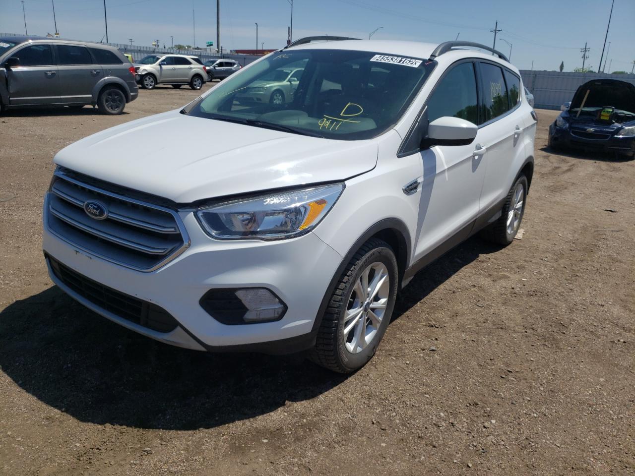 Photo 2 from auction – 2018 FORD ESCAPE SE with VIN 1FMCU0GD5JUC19911