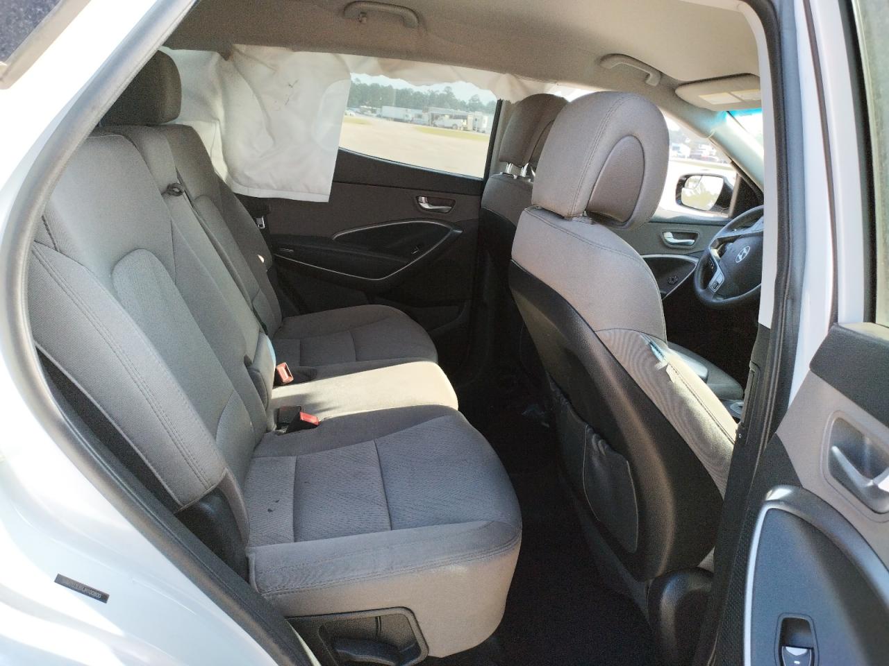 Photo 6 from auction – 2018 HYUNDAI SANTA FE S with VIN 5NMZU3LBXJH100800