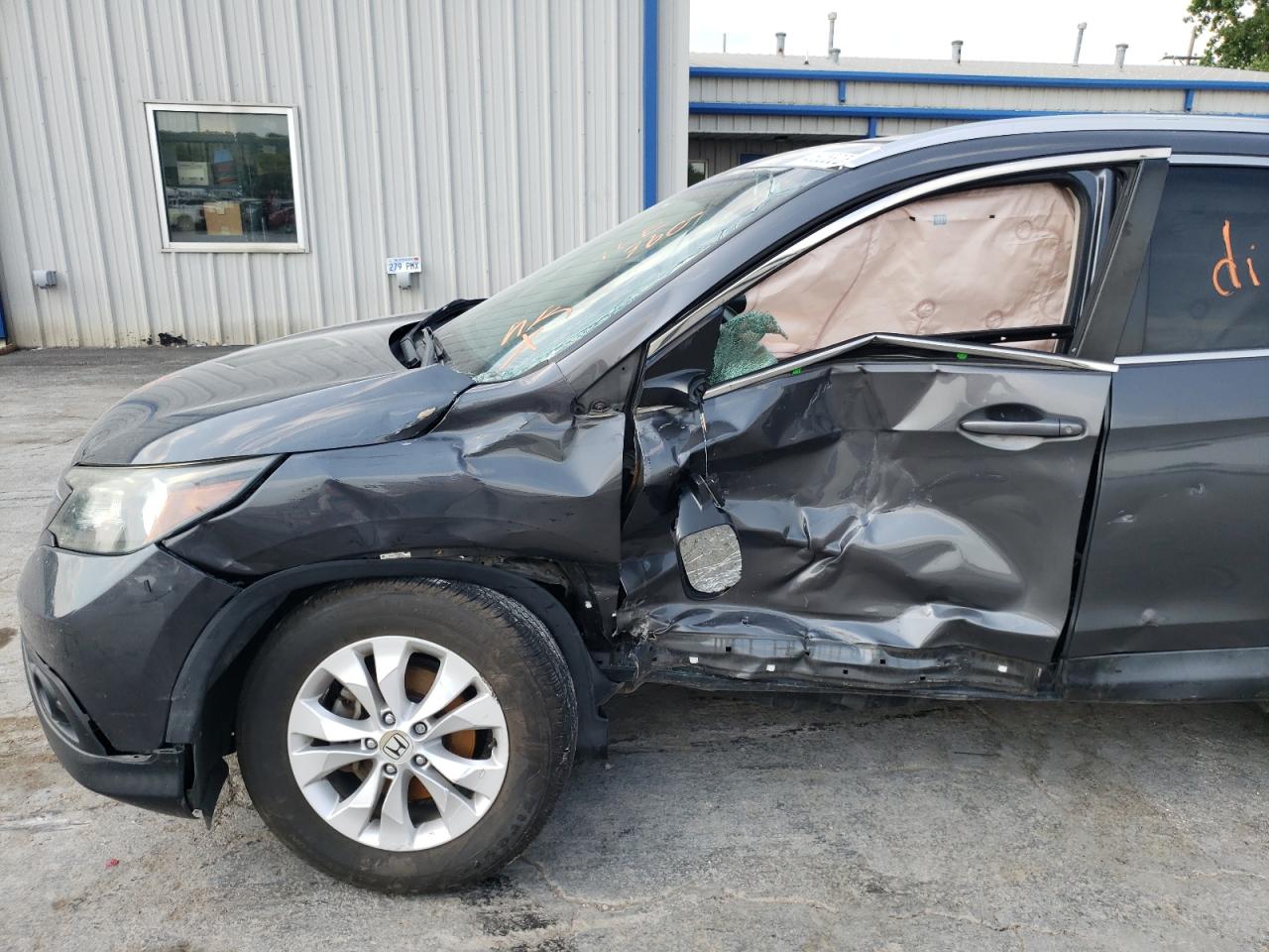 Photo 16 from auction – 2014 HONDA CR-V EXL with VIN 2HKRM3H75EH552165