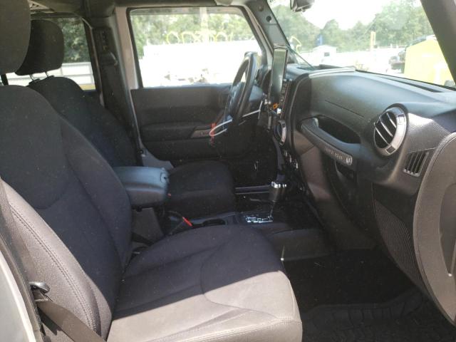 Photo 5 from auction – 2014 JEEP WRANGLER U with VIN 1C4BJWDG5EL144391