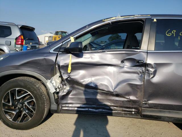 Photo 9 from auction – 2016 HONDA CR-V SE with VIN 2HKRM3H46GH561790