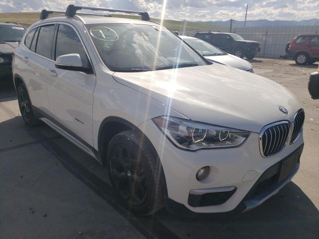 BMW X1 XDRIVE2 2017 with VIN WBXHT3C30H5F85572 - Photo from auction