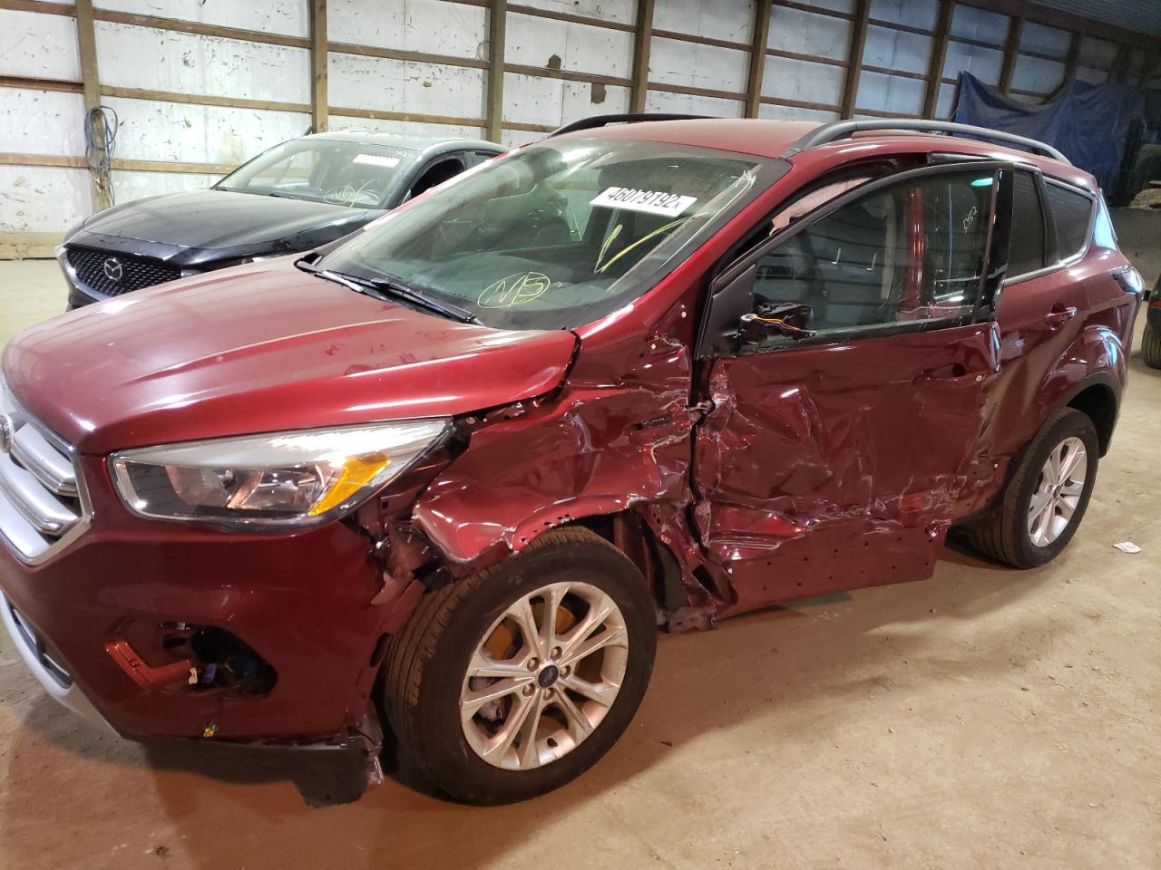Photo 9 from auction – 2018 FORD ESCAPE SE with VIN 1FMCU0GD0JUD02923