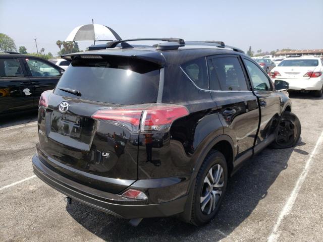 Photo 4 from auction – 2018 TOYOTA RAV4 LE with VIN 2T3ZFREV3JW434859