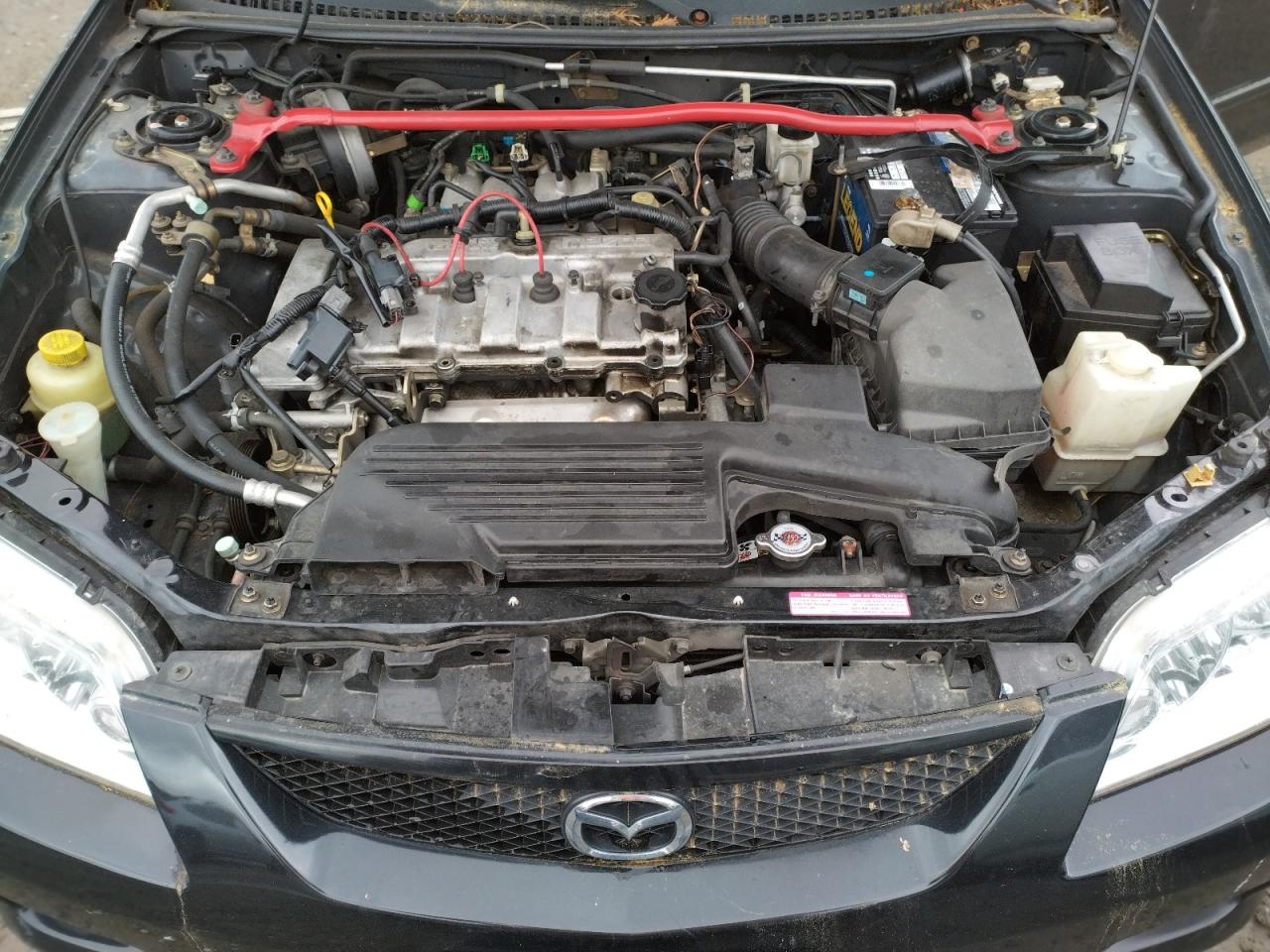 Photo 7 from auction – 2003 MAZDA PROTEGE PR with VIN JM1BJ245X31205945