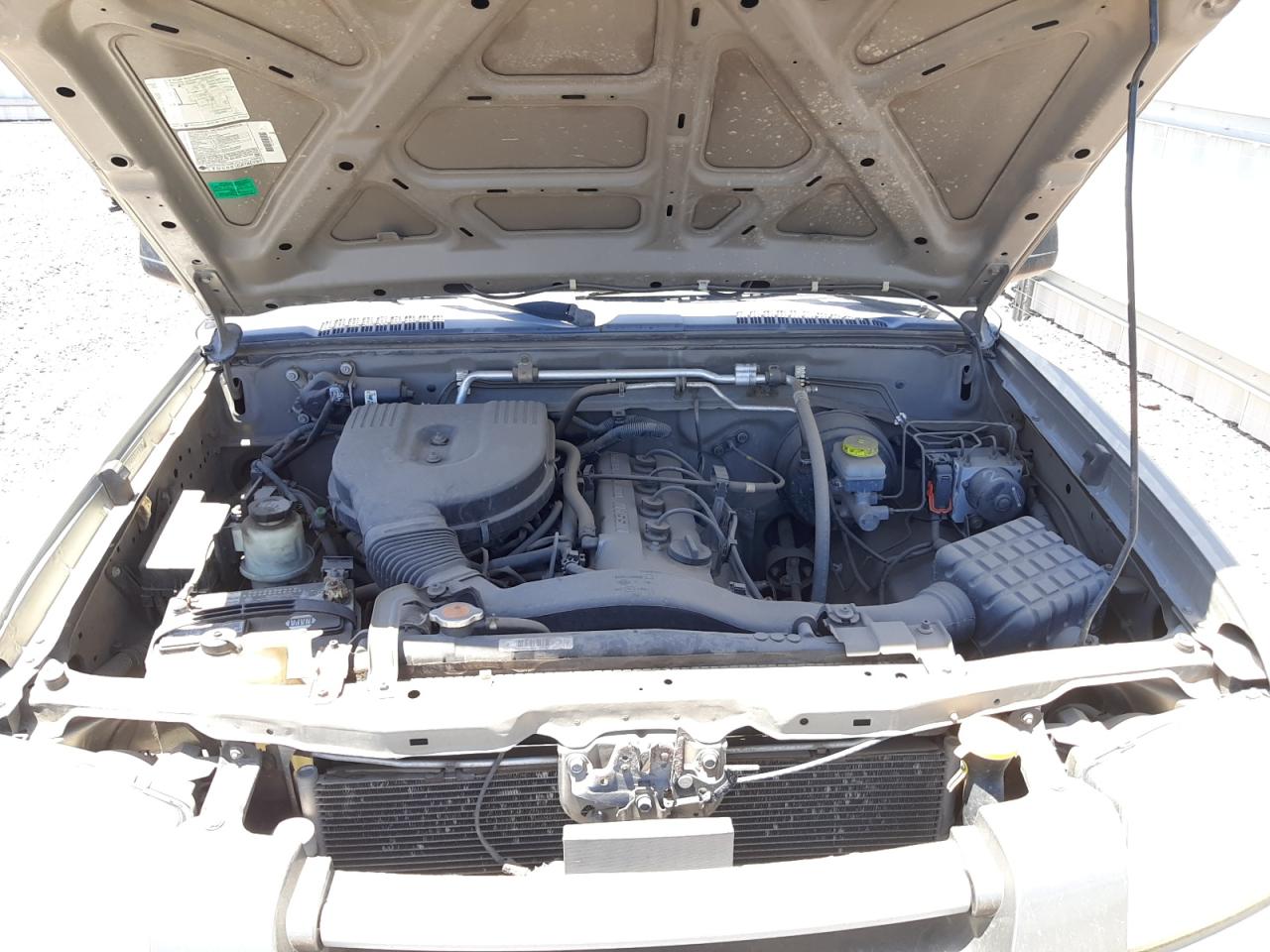 Photo 7 from auction – 2004 NISSAN FRONTIER K with VIN 1N6DD26T04C466242