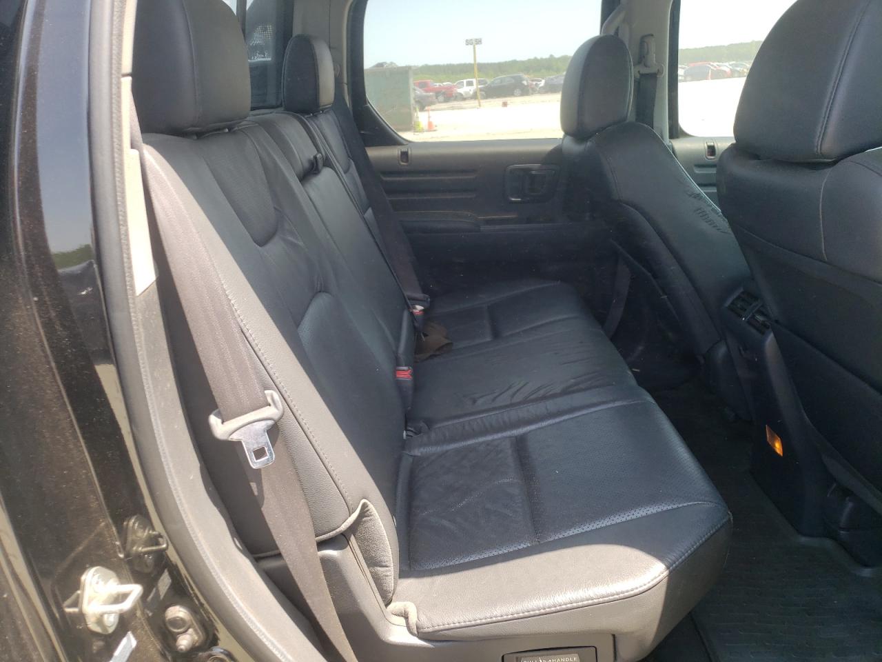 Photo 16 from auction – 2010 HONDA RIDGELINE with VIN 5FPYK1F52AB005717