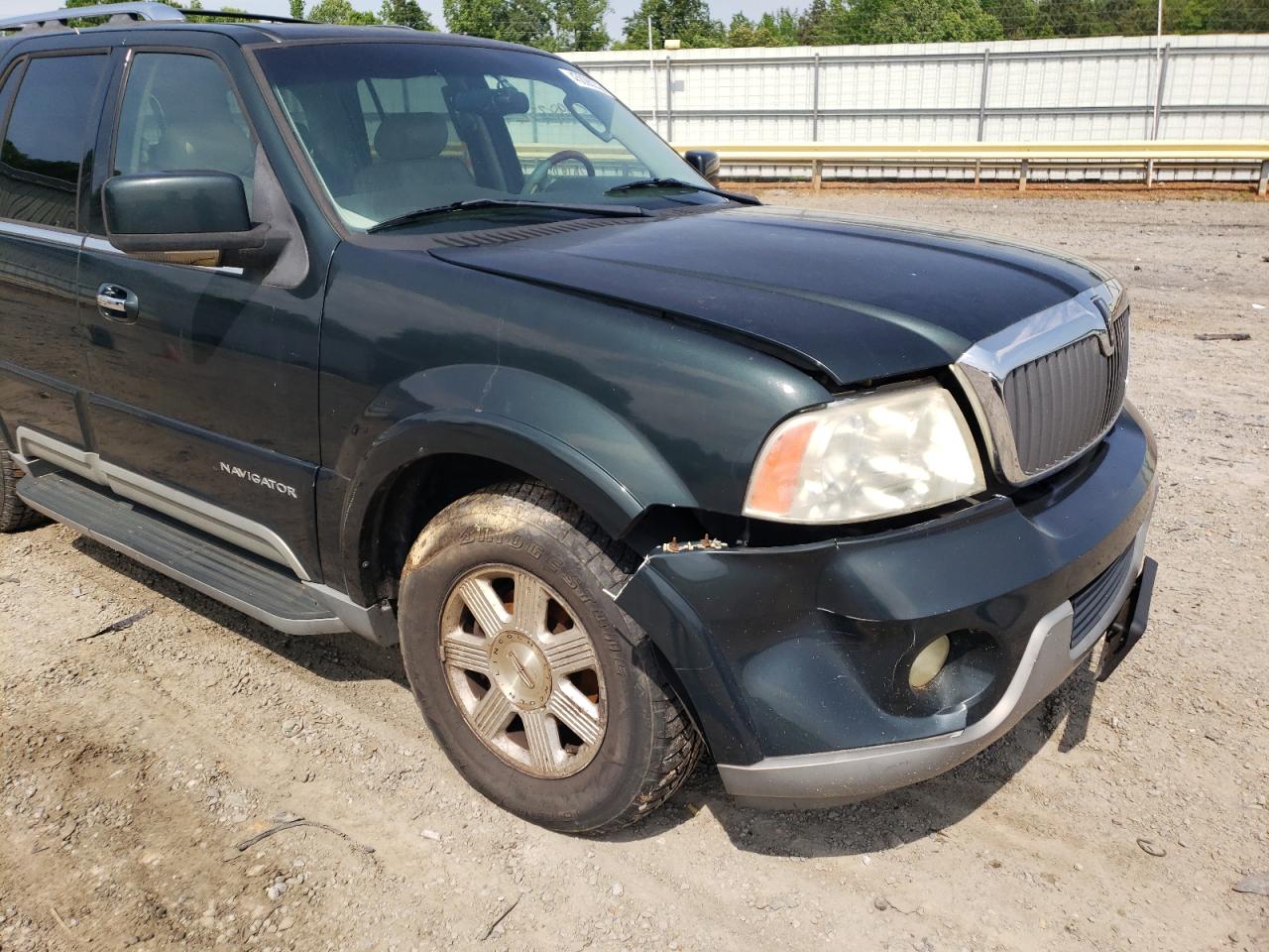 Photo 9 from auction – 2003 LINCOLN NAVIGATOR with VIN 5LMFU28R23LJ02148
