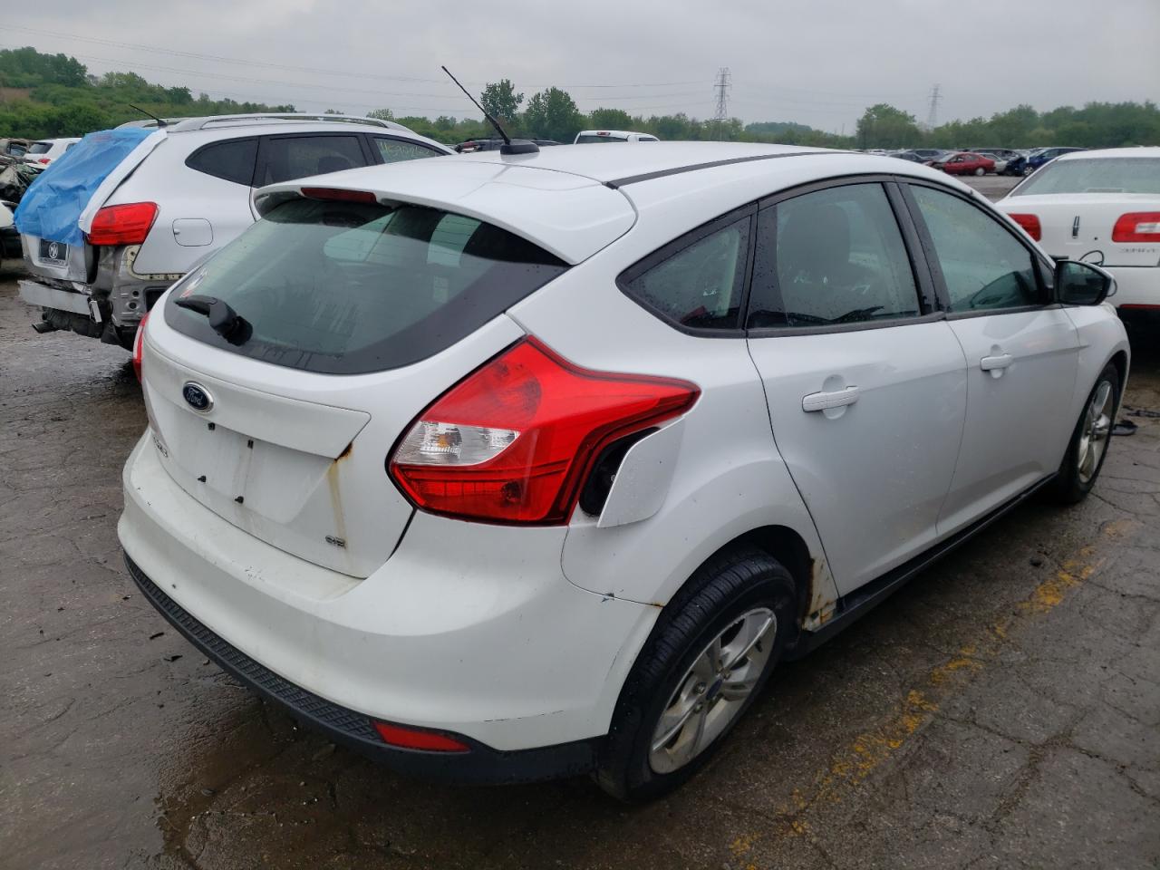 Foto 4 de la subasta – 2012 FORD FOCUS SE con VIN 1FAHP3K25CL122215