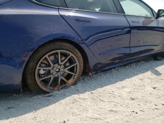 Photo 9 from auction – 2022 TESLA MODEL 3 with VIN 5YJ3E1EB7NF177135
