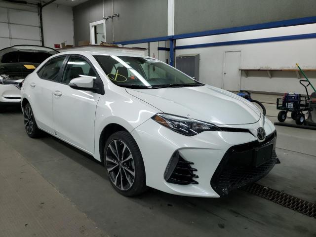 TOYOTA COROLLA L 2017 with VIN 5YFBURHE5HP643852 - Photo from auction