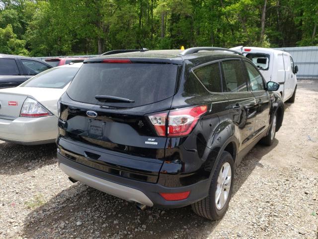 Photo 4 from auction – 2018 FORD ESCAPE SE with VIN 1FMCU0GD3JUA78210