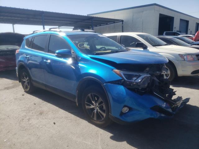 TOYOTA RAV4 2018 with VIN 2T3WFREV4JW458025 - Photo from auction