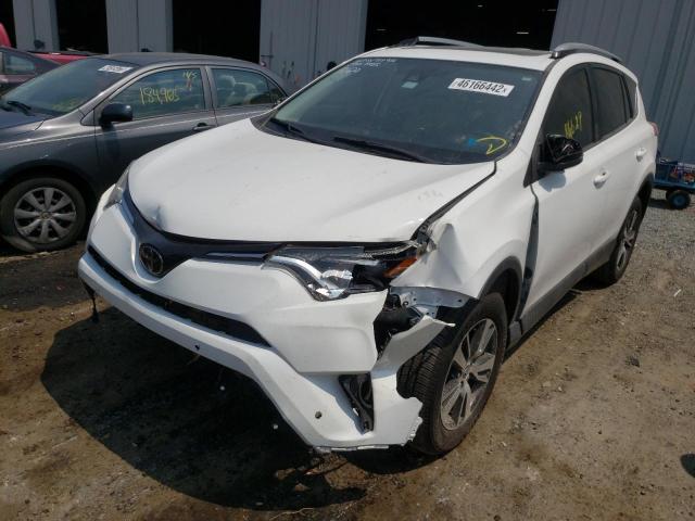 Photo 2 from auction – 2017 TOYOTA RAV4 XLE with VIN JTMWFREVXHD107031