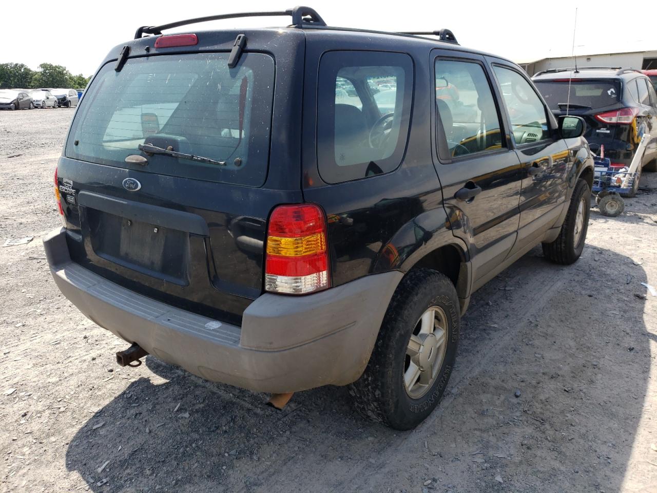 Photo 4 from auction – 2002 FORD ESCAPE XLS with VIN 1FMYU02102KC83077