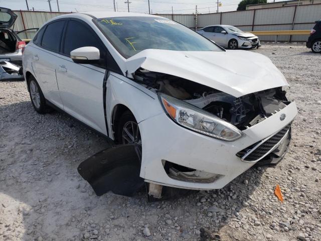 FORD FOCUS SE 2016 with VIN 1FADP3F28GL291191 - Photo from auction