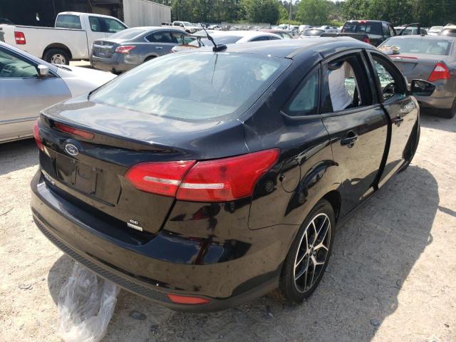 Photo 4 from auction – 2017 FORD FOCUS SE with VIN 1FADP3FE5HL241103
