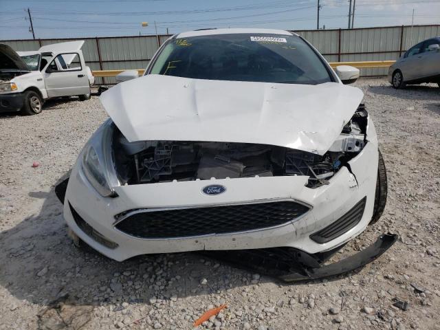 Photo 9 from auction – 2016 FORD FOCUS SE with VIN 1FADP3F28GL291191