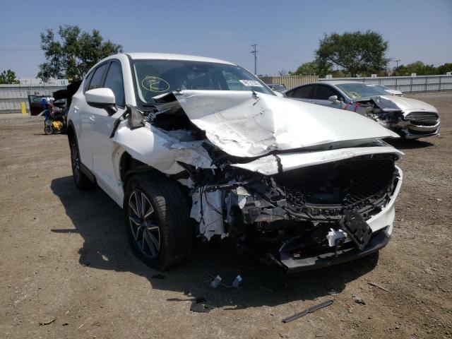 MAZDA CX-5 TOURI 2018 with VIN JM3KFACMXJ1353084 - Photo from auction