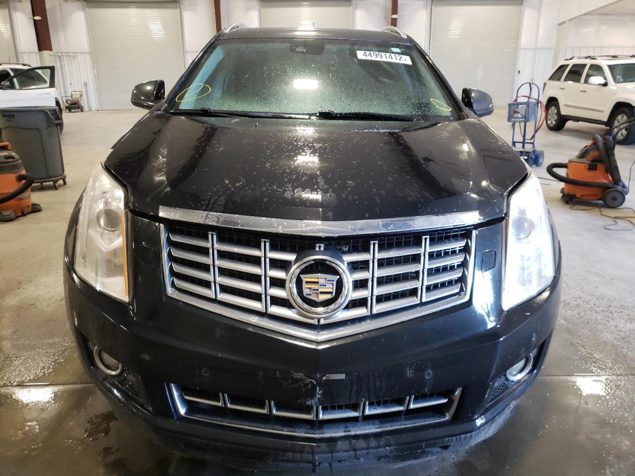 Photo 20 from auction – 2014 CADILLAC SRX PREMIU with VIN 3GYFNGE35ES534841