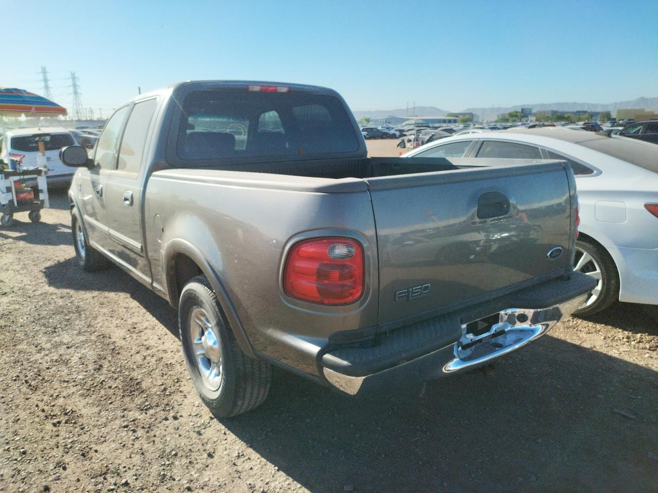 Photo 3 from auction – 2002 FORD F150 SUPER with VIN 1FTRW07602KD31295