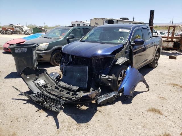 Photo 2 from auction – 2020 HONDA RIDGELINE with VIN 5FPYK3F50LB031148