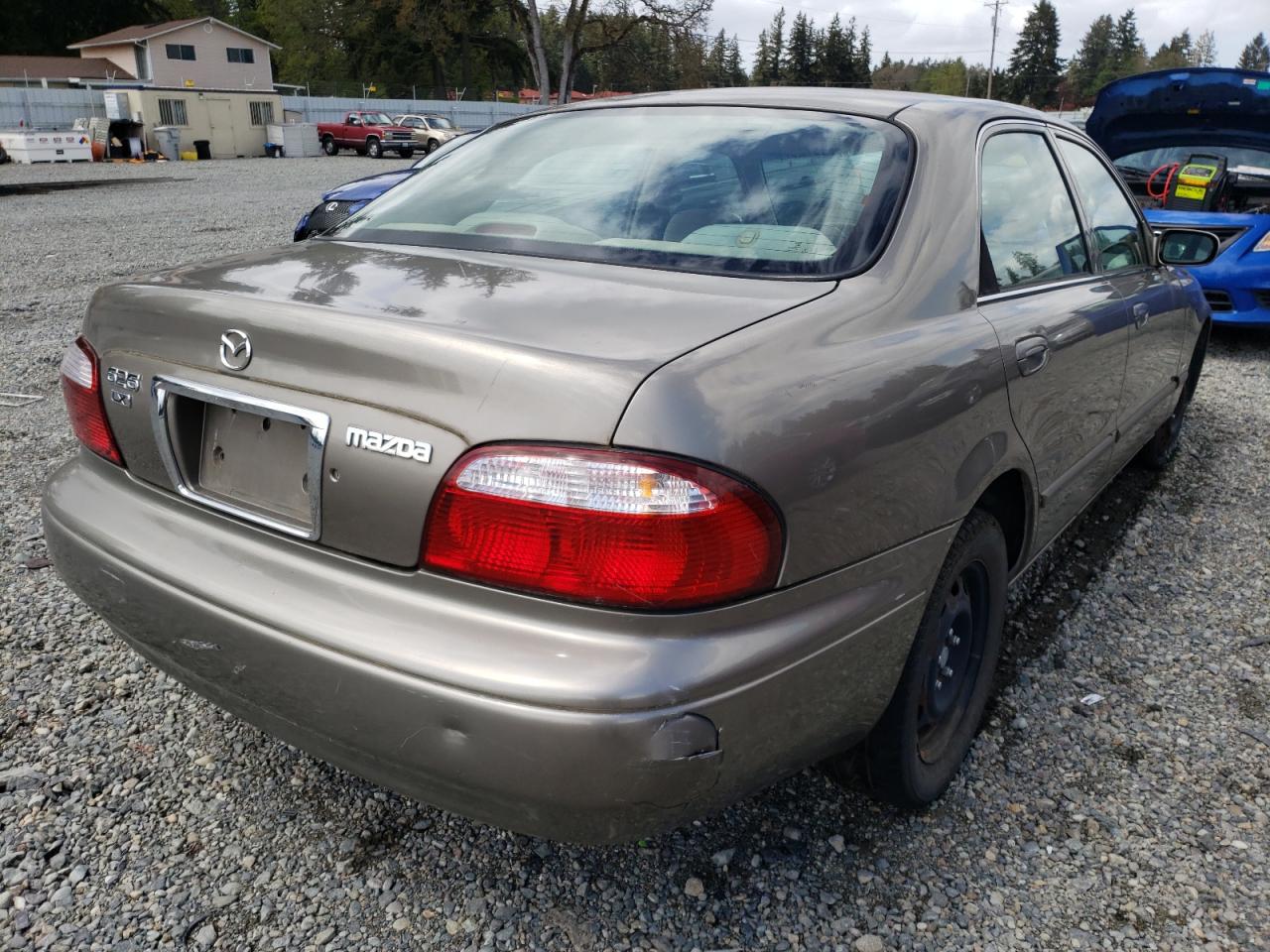 Photo 4 from auction – 2001 MAZDA 626 ES with VIN 1YVGF22C215206211