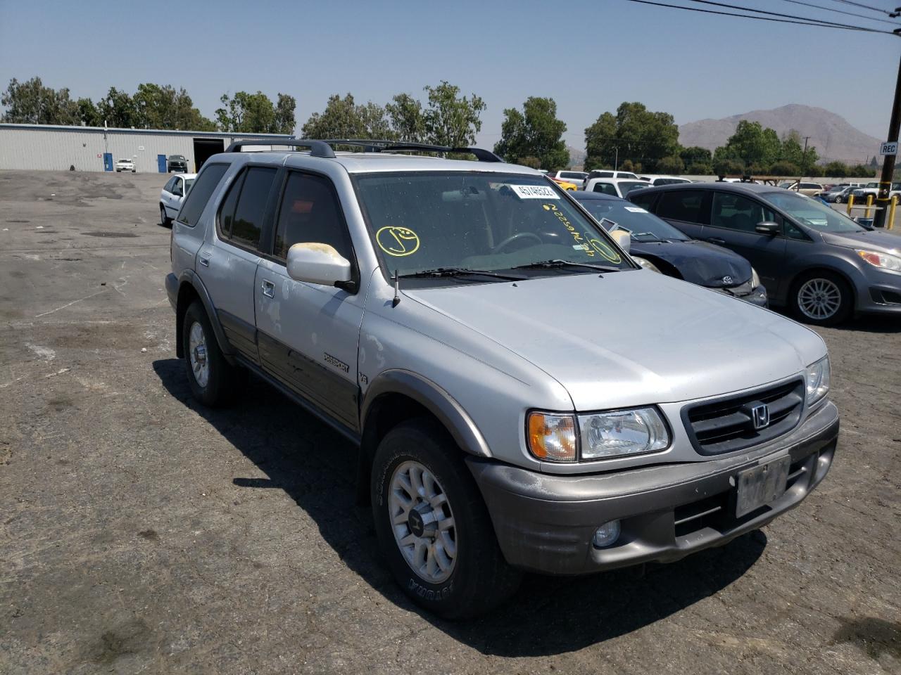 HONDA PASSPORT E 2001 مع رقم تعريف المركبة 4S6CK58W214402600 - صورة من المزاد