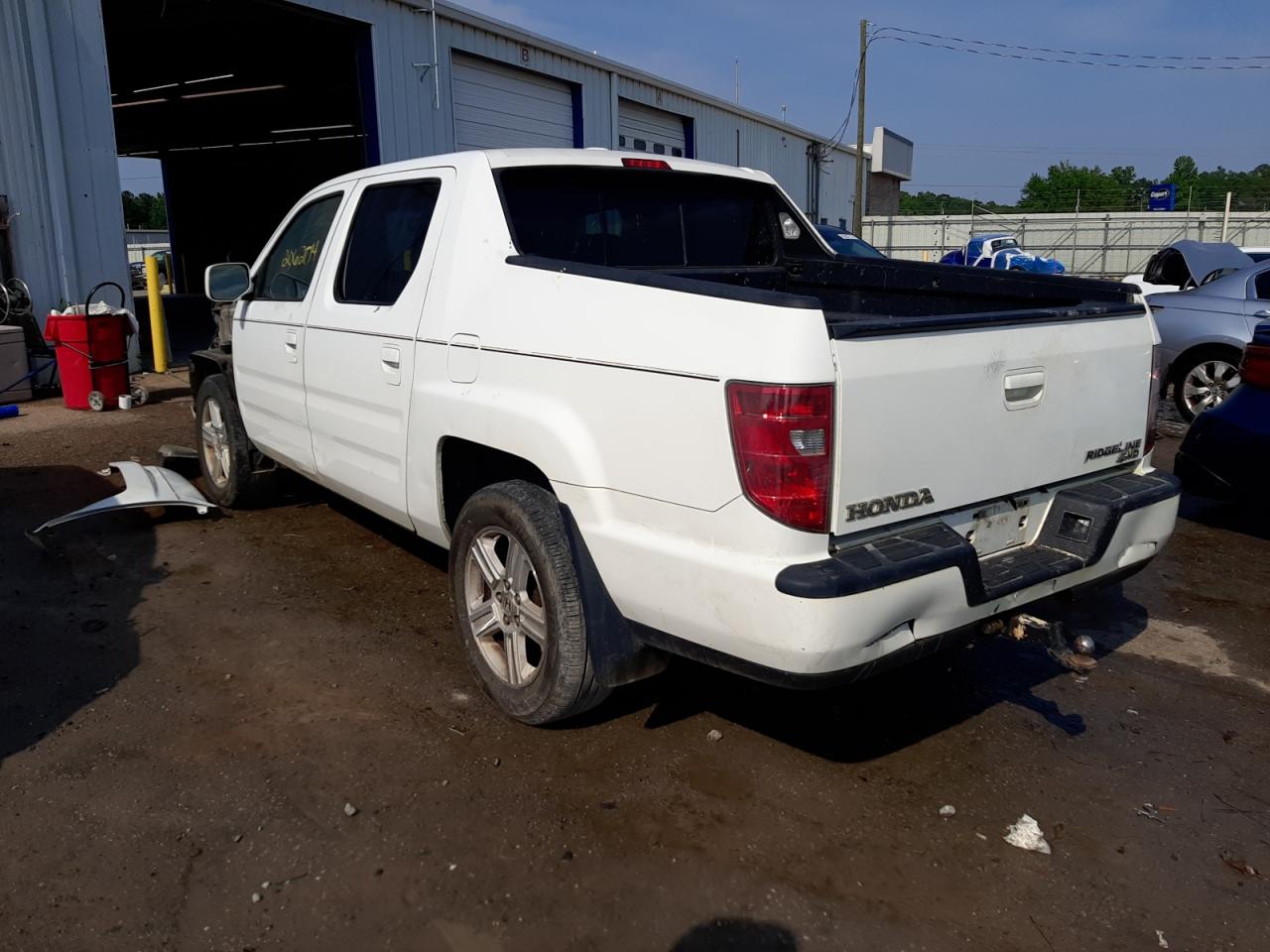 Photo 3 from auction – 2009 HONDA RIDGELINE with VIN 5FPYK16559B104382