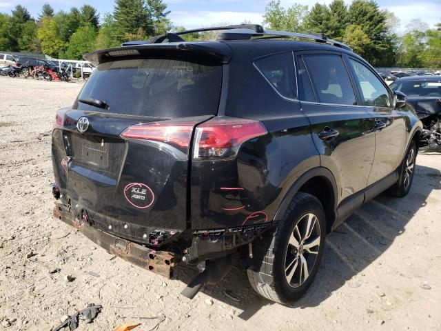 Photo 4 from auction – 2016 TOYOTA RAV4 XLE with VIN 2T3RFREV4GW487966