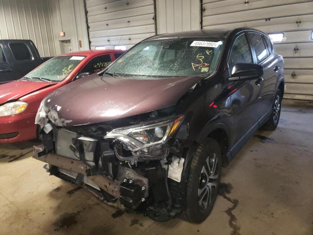 Photo 2 from auction – 2018 TOYOTA RAV4 LE with VIN 2T3BFREV3JW711091