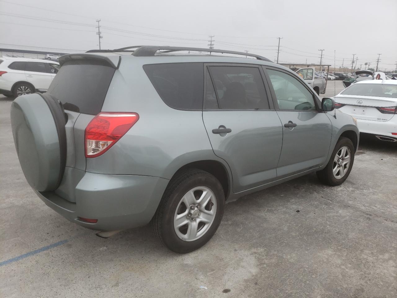 Photo 4 from auction – 2007 TOYOTA RAV4 with VIN JTMZD33V476028086
