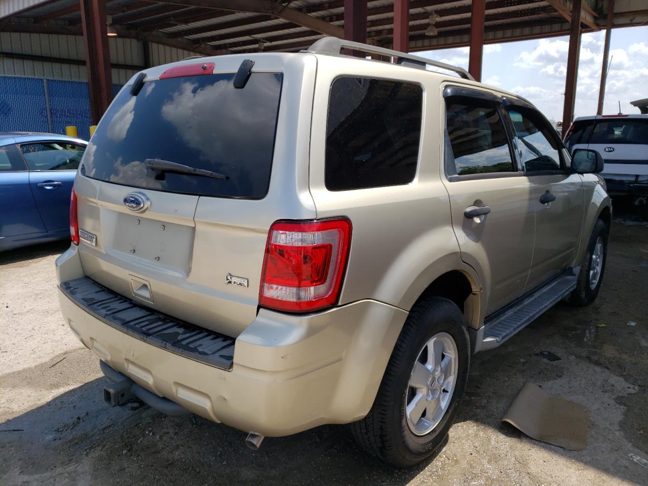 Photo 4 from auction – 2010 FORD ESCAPE XLT with VIN 1FMCU9D76AKB79238