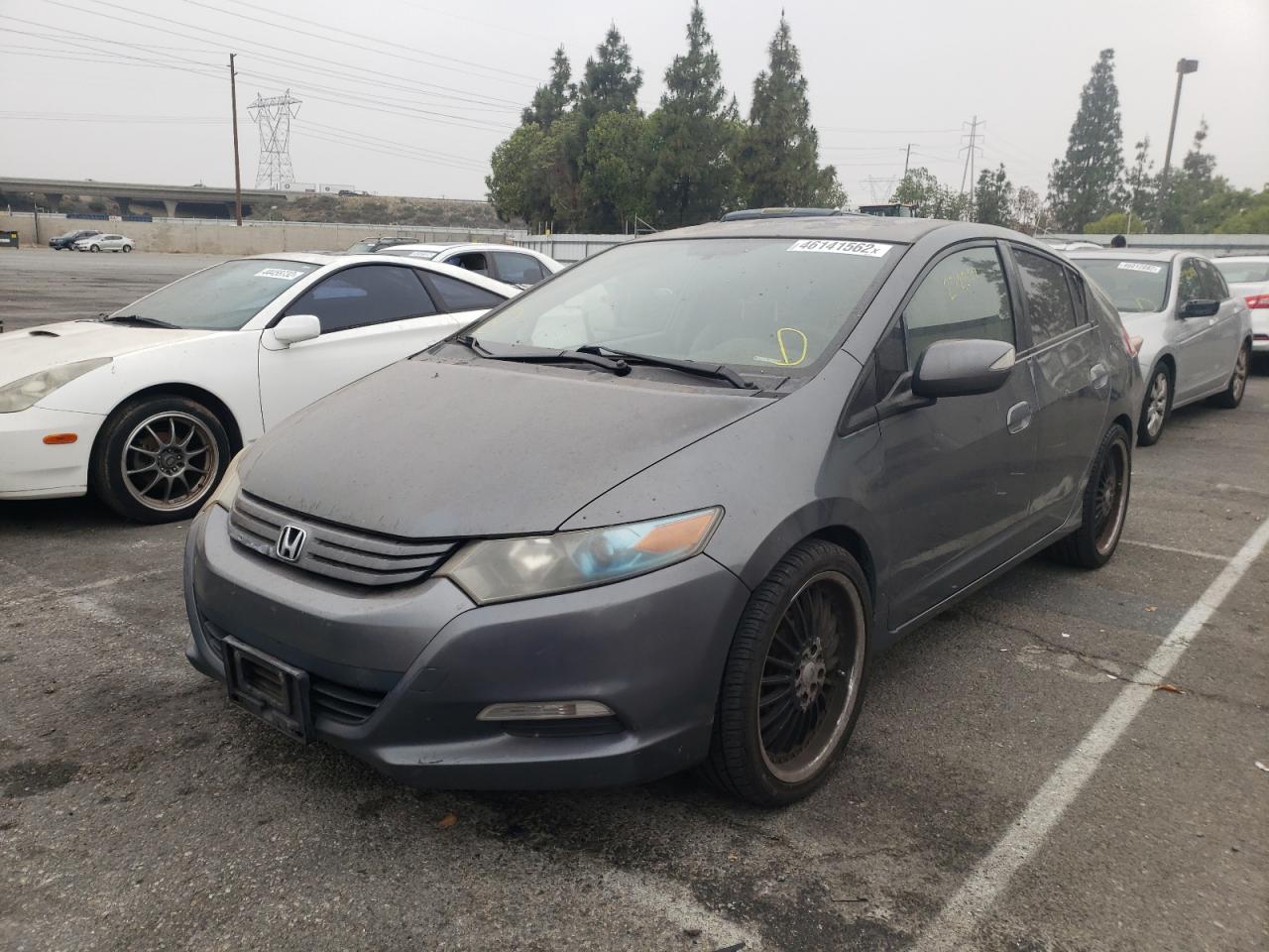 Photo 2 from auction – 2010 HONDA INSIGHT EX with VIN JHMZE2H78AS020443