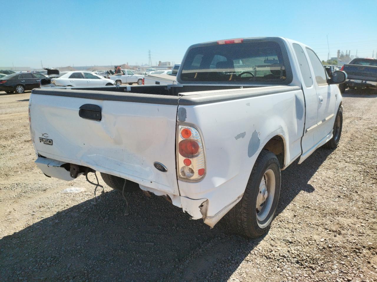 Photo 4 from auction – 2002 FORD F150 with VIN 1FTRX17W02KA57809