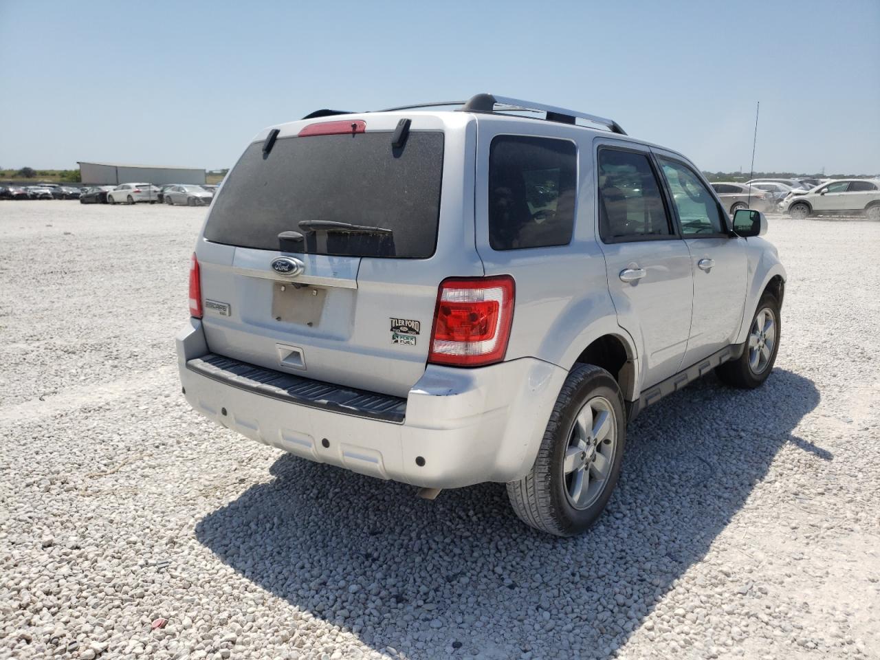 Photo 4 from auction – 2011 FORD ESCAPE LIM with VIN 1FMCU0EG9BKB13231
