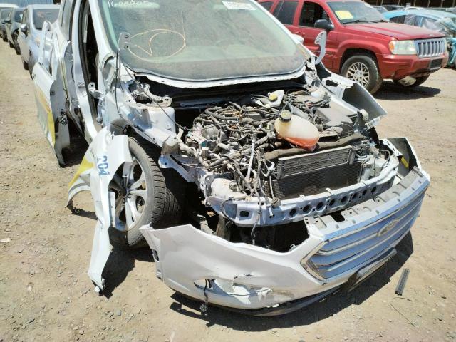 Photo 9 from auction – 2018 FORD ESCAPE SE with VIN 1FMCU9GDXJUA28585