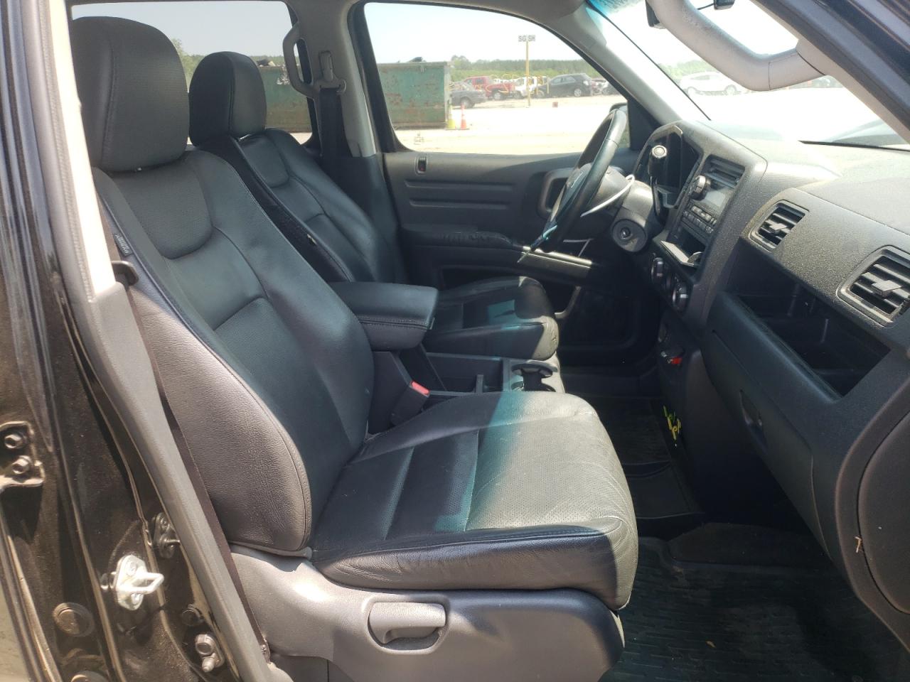 Photo 15 from auction – 2010 HONDA RIDGELINE with VIN 5FPYK1F52AB005717