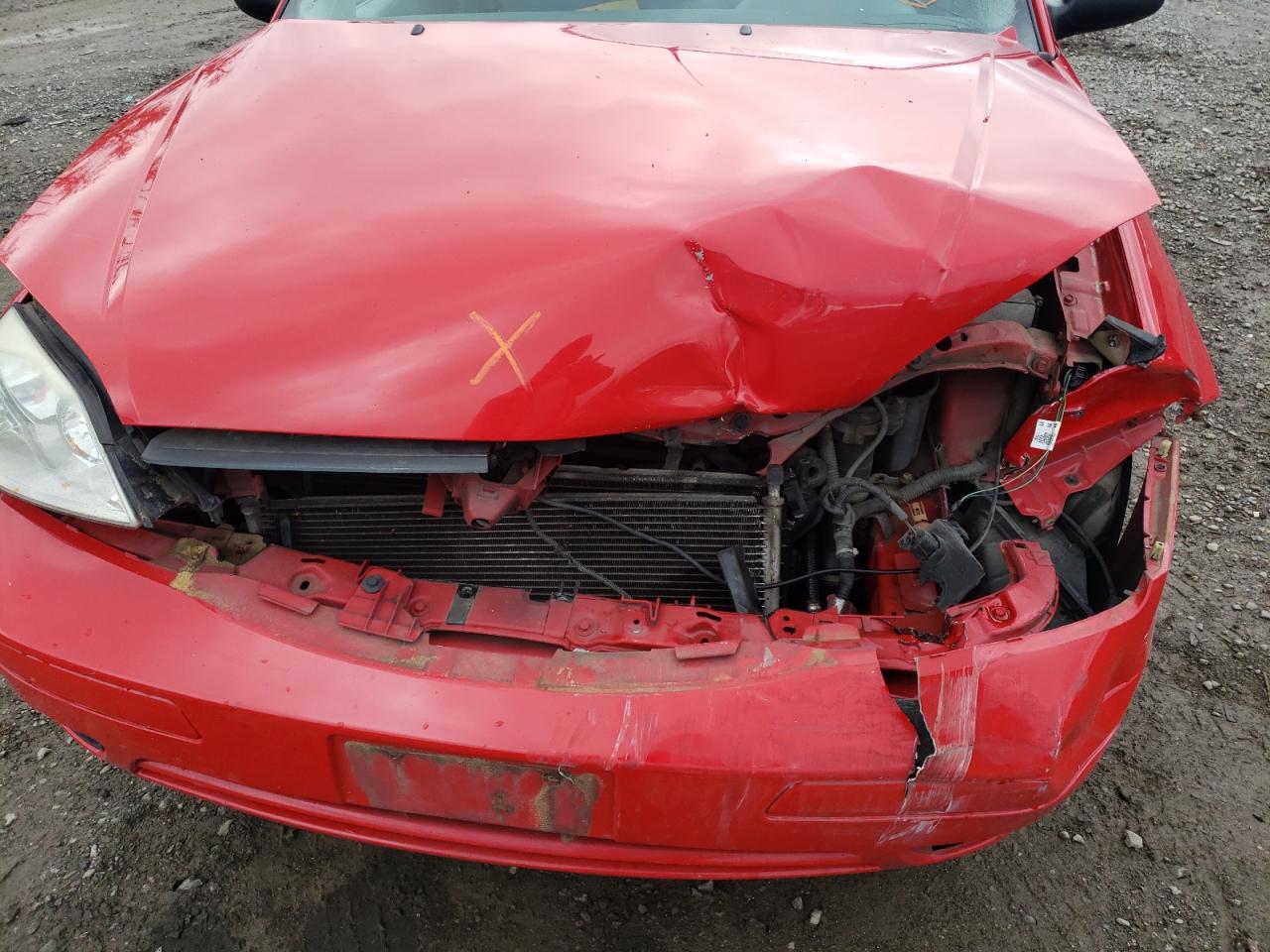 Photo 19 from auction – 2005 FORD FOCUS ZX4 with VIN 1FAFP34N05W299268