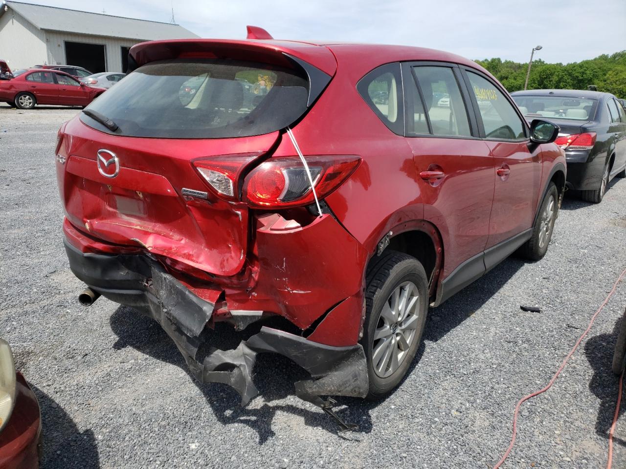 Photo 4 from auction – 2015 MAZDA CX-5 SPORT with VIN JM3KE2BE2F0534955
