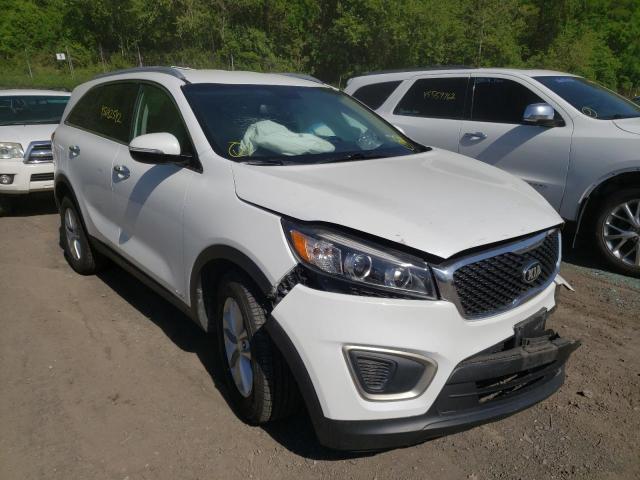 KIA SORENTO LX 2016 with VIN 5XYPGDA35GG061133 - Photo from auction