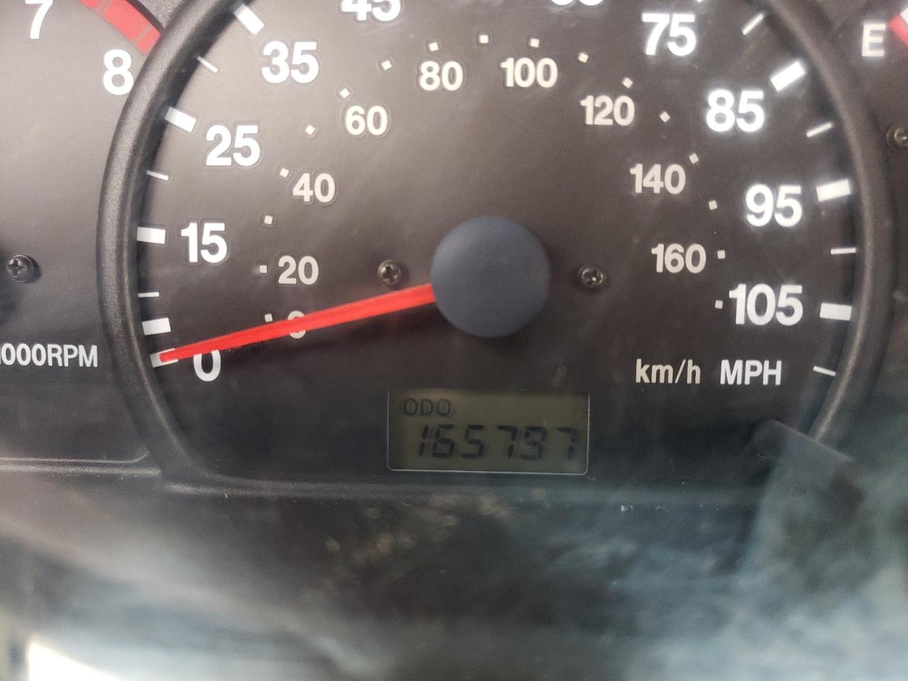 Photo 8 from auction – 2000 CHEVROLET TRACKER with VIN 2CNBE13C5Y6915348