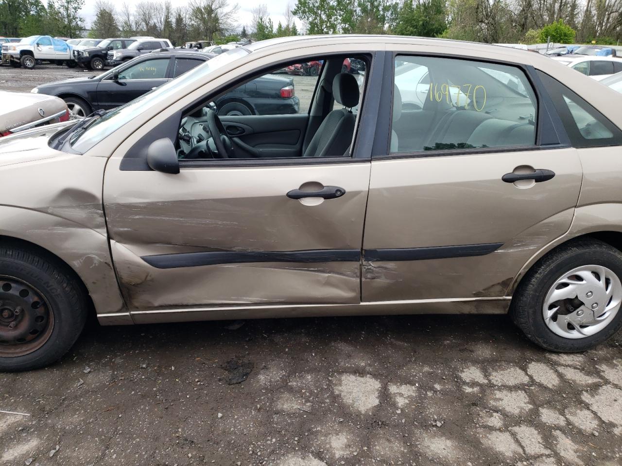 Photo 9 from auction – 2003 FORD FOCUS LX with VIN 1FAFP33P63W283561