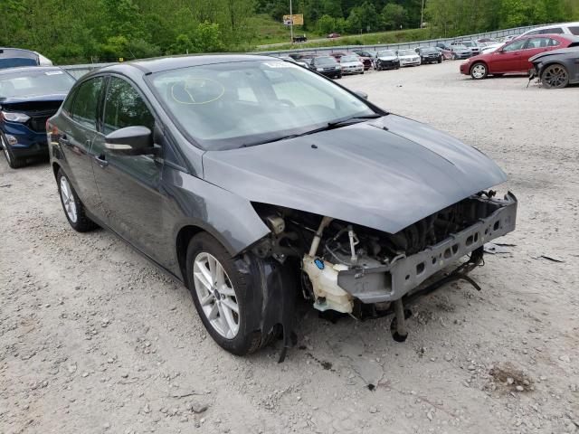 FORD FOCUS SE 2017 with VIN 1FADP3F25HL297886 - Photo from auction