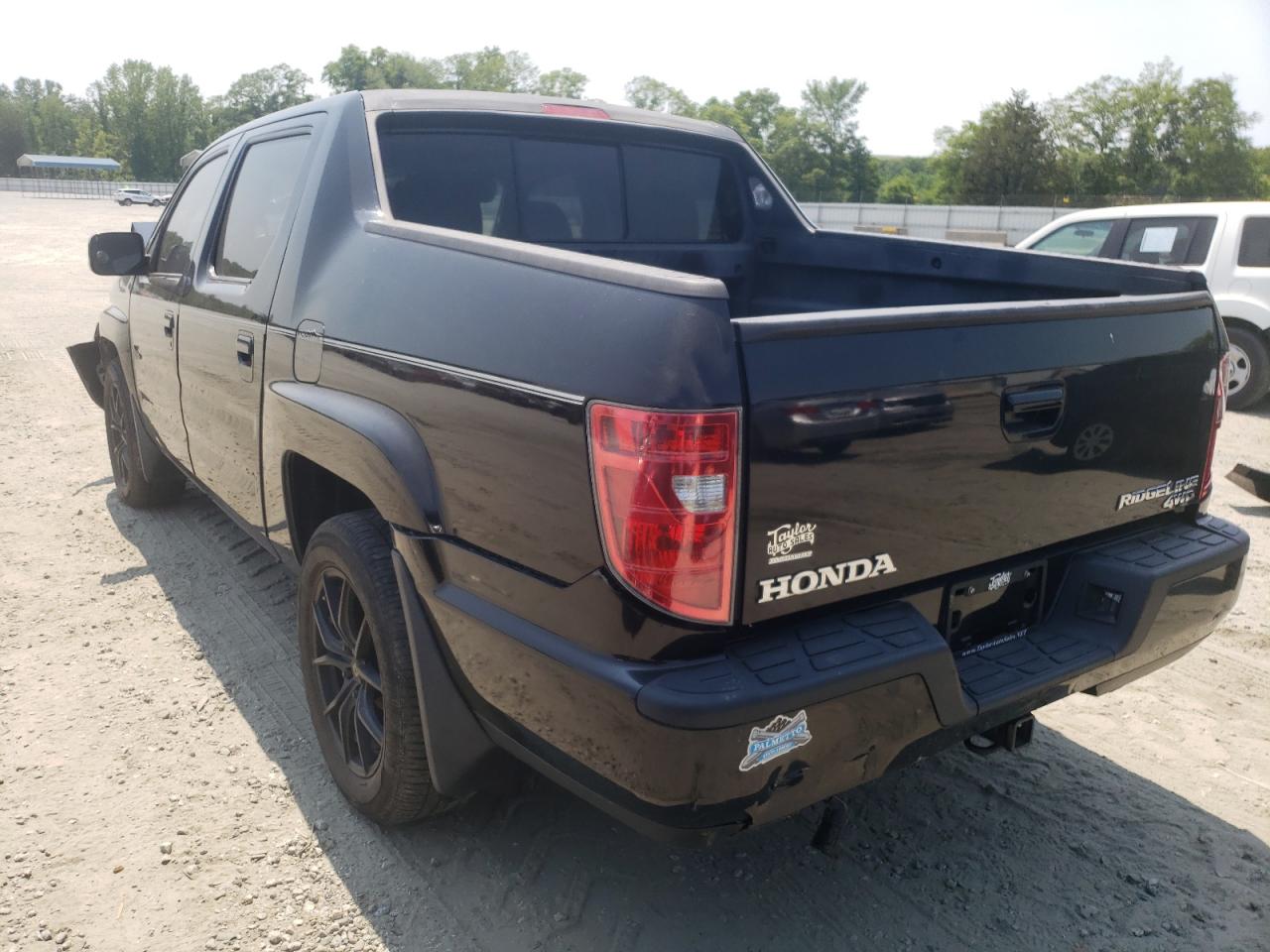 Photo 13 from auction – 2010 HONDA RIDGELINE with VIN 5FPYK1F52AB005717