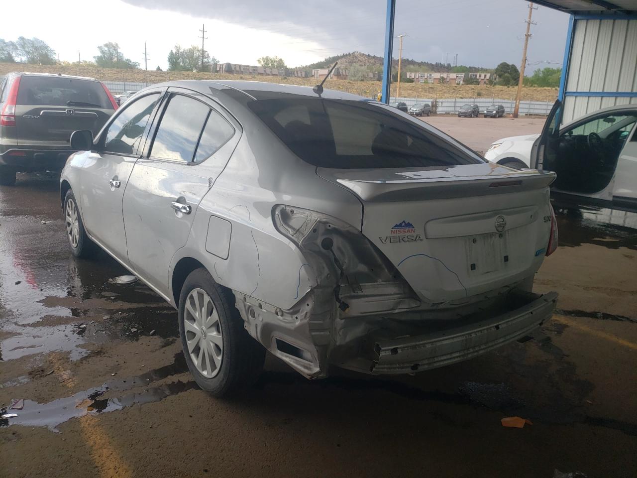 Photo 3 from auction – 2014 NISSAN VERSA S with VIN 3N1CN7AP9EL867722
