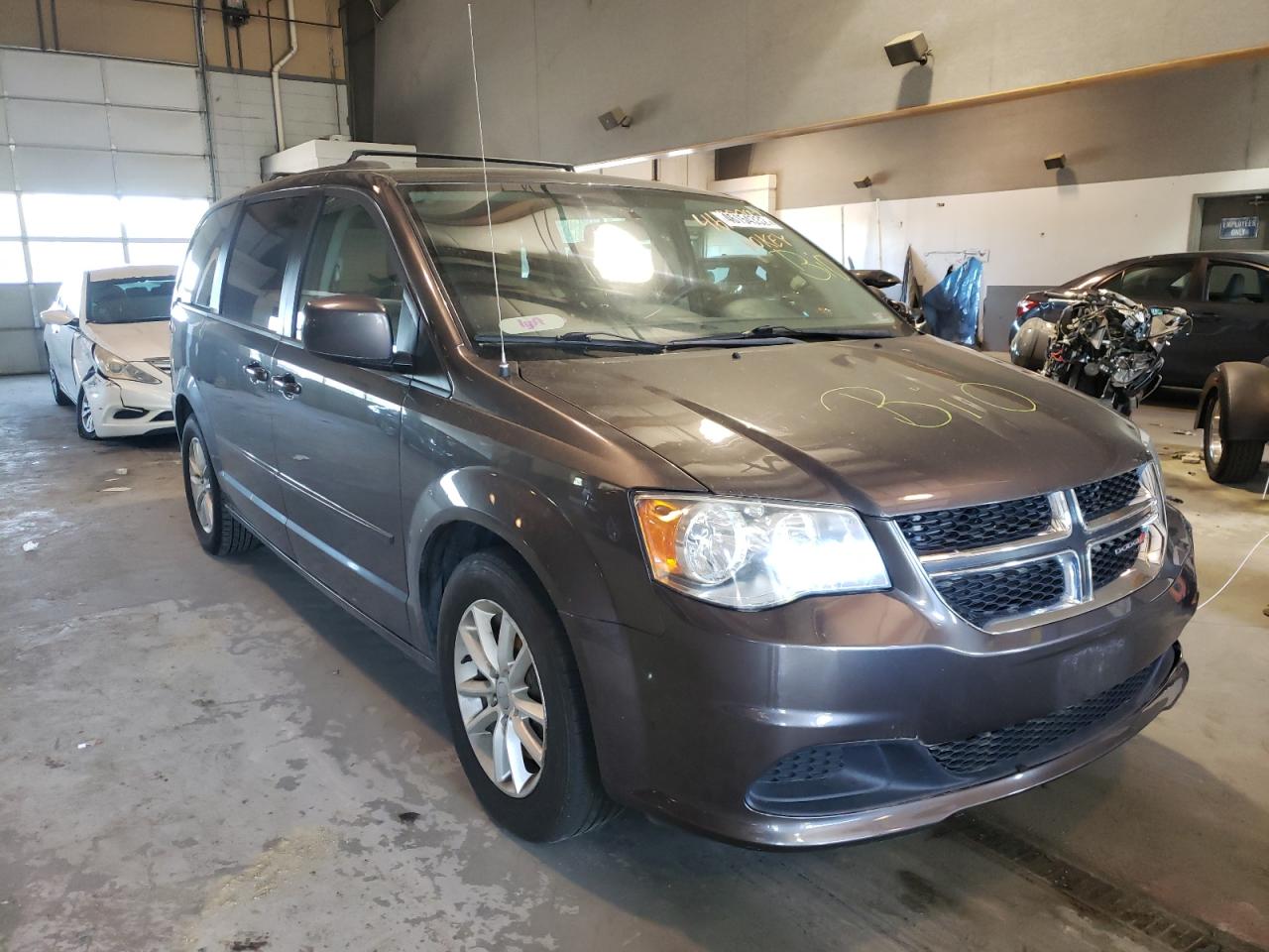 DODGE GRAND CARA 2016 with VIN 2C4RDGCG3GR330017 - Photo from auction