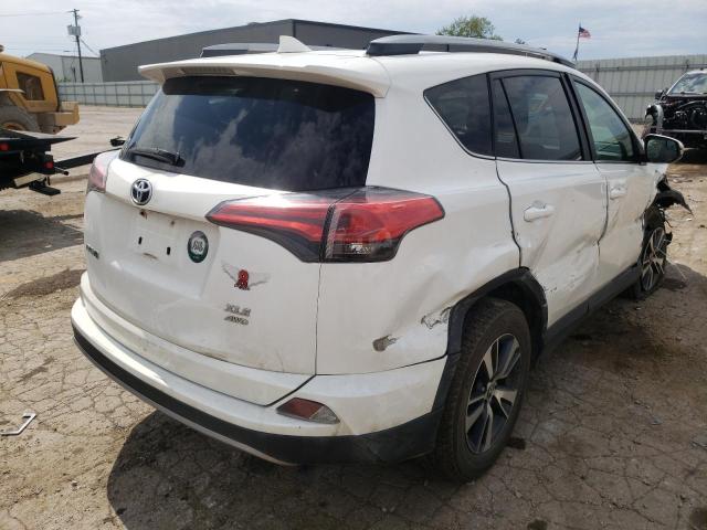 Photo 4 from auction – 2017 TOYOTA RAV4 XLE with VIN 2T3RFREV0HW624693