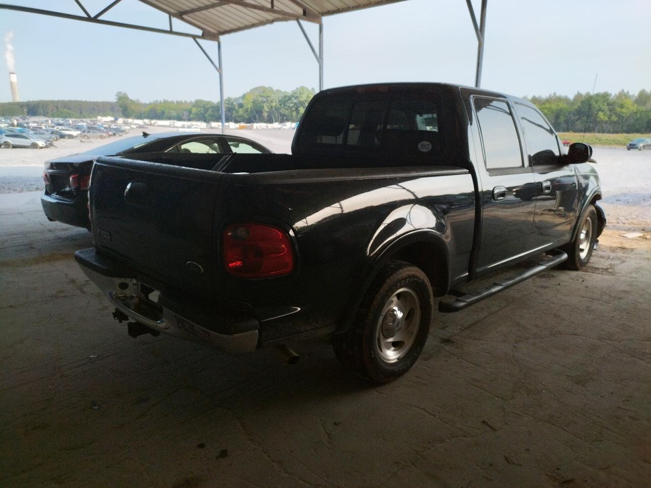 Photo 4 from auction – 2003 FORD F150 SUPER with VIN 1FTRW07L73KA76930